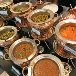 a traditional indian vegetarian buffet table.